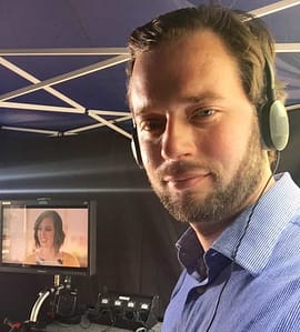 Garrett Strommen working on set as an Italian dialect coach